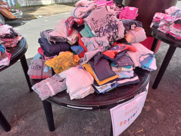 Foto 11:  Varal Solidário leva roupas à população de Quatá 
